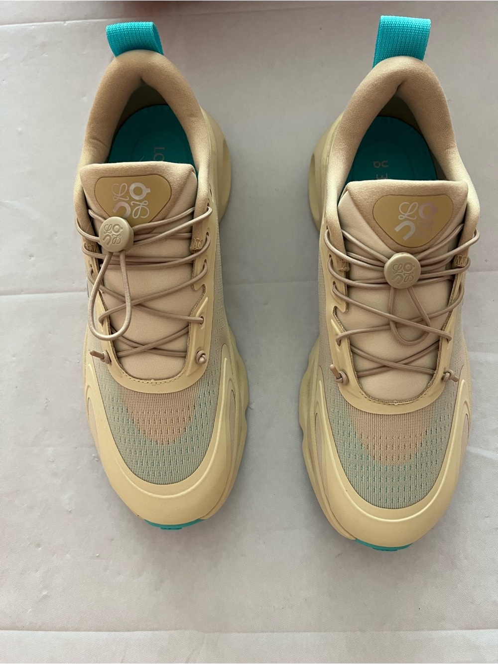 Loewe Beige Sneakers with Teal Pull Tabs